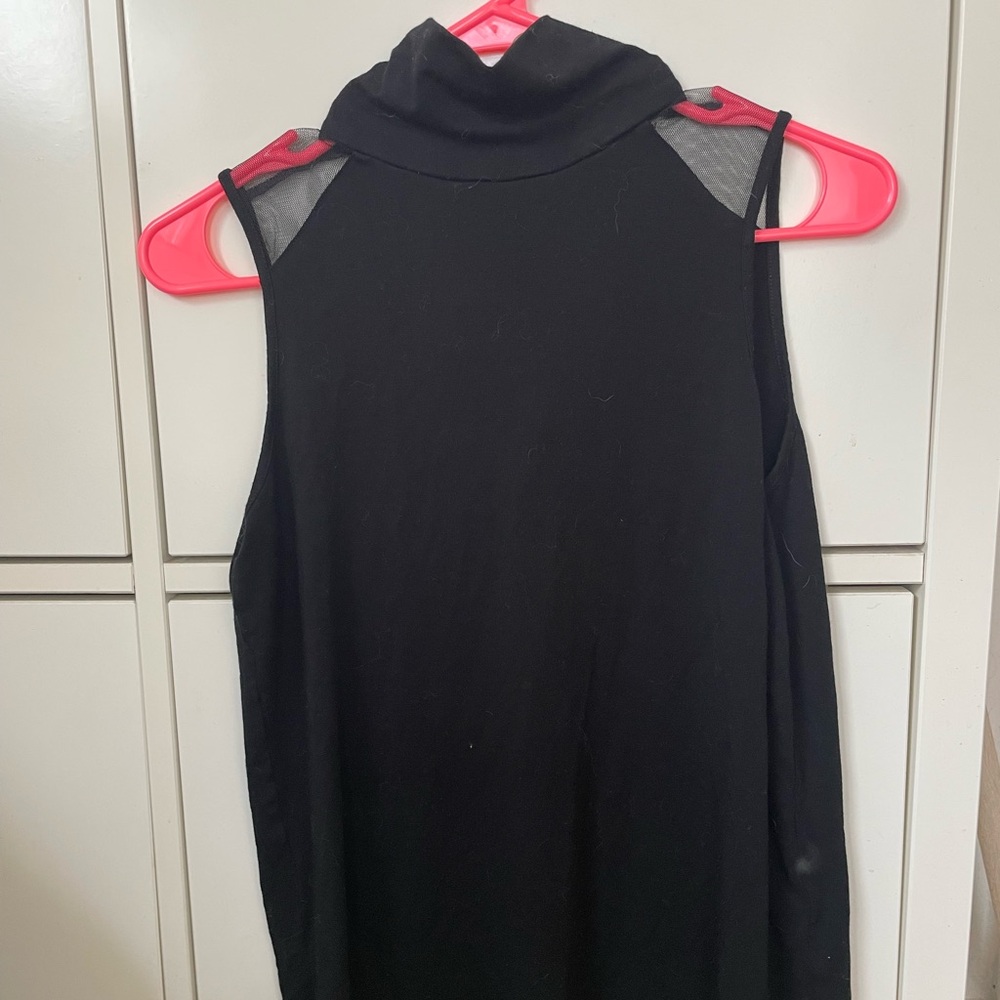 Sleeveless Turtleneck with mesh panels